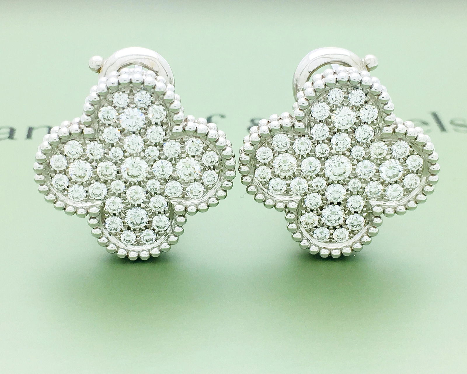 Van Cleef & Arpels Magic Alhambra 18k & Diamond: Van Cleef & Arpels Magic Alhambra Earrings 18k White Gold & Diamonds weight 19.4g-74 Stones 2.13 TCW Magic Alhambra earrings, white gold, round diamonds; diamond quality DEF, IF to VVS.-Clip system fo