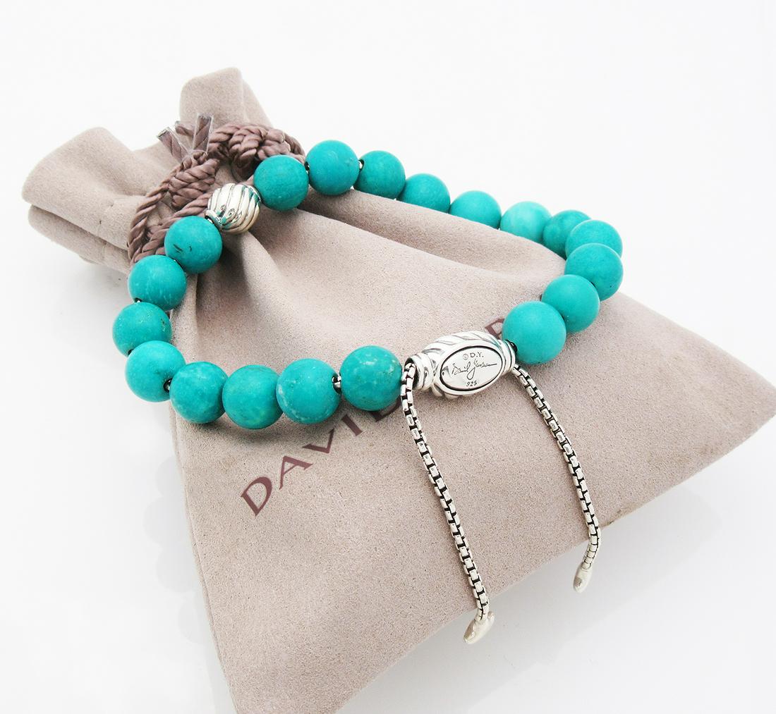 David Yurman Silver Turquoise Spiritual Beads: David Yurman Sterling Silver Spiritual Turquoise Silver Accent 8mm Beads Bracelet Metal: Sterling Silver Stone: Turquoise (8mm.) Size: Adjustable Condition: Like new Comes with DY pouch
