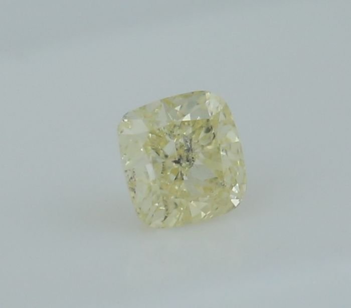 IGI Cert. 0.37 ct. Diamond - Fancy Light Yellow - I 1: IGI Certified 0.37 ct. Diamond - Fancy Light Yellow - I 1 100% NaturalShape - Square Cushion Modified BrilliantColor - Fancy Light YellowClarity - I 1Ct. Weight - 0.37 ct.Measurement