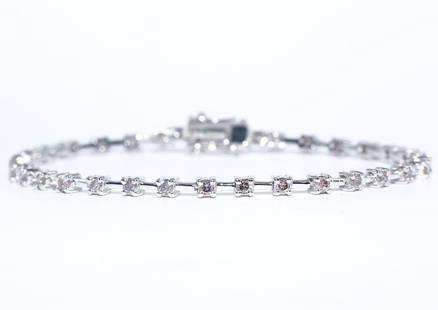 14 K / 585 White Gold " PINK " Diamond Tennis Bracelet: 14 K White Gold Pink Diamond Tennis Bracelet Tongue Lock and extra safety locks Gross Metal Weight - 11.9 g Bracelet in 14 K Hallmarked White Gold Bracelet Length - 7.5 Inches with Lock &