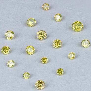0.55 ct. Fancy Yellow Diamond Lot - UNTREATED: 0.55 ct. Fancy Yellow Diamond Lot - SI-I - UNTREATED Cut - Round Brilliant Color - Fancy Yellow Clarity - SI-I Ct. Weight - 0.55 ct. Size : mix sizes Number of diamonds - Not counte