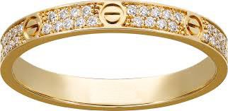 18K/750 Yellow Gold CARTIER Style Eternity Diamond Band: 18 K / 750 Yellow Gold CARTIER Style Eternity Diamond Band Ring 18 K / 750 Hallmarked Yellow gold Gross Gold weight - 6.000 g Ring size - US 7 Total ct. Weight - 0.55 ct. 