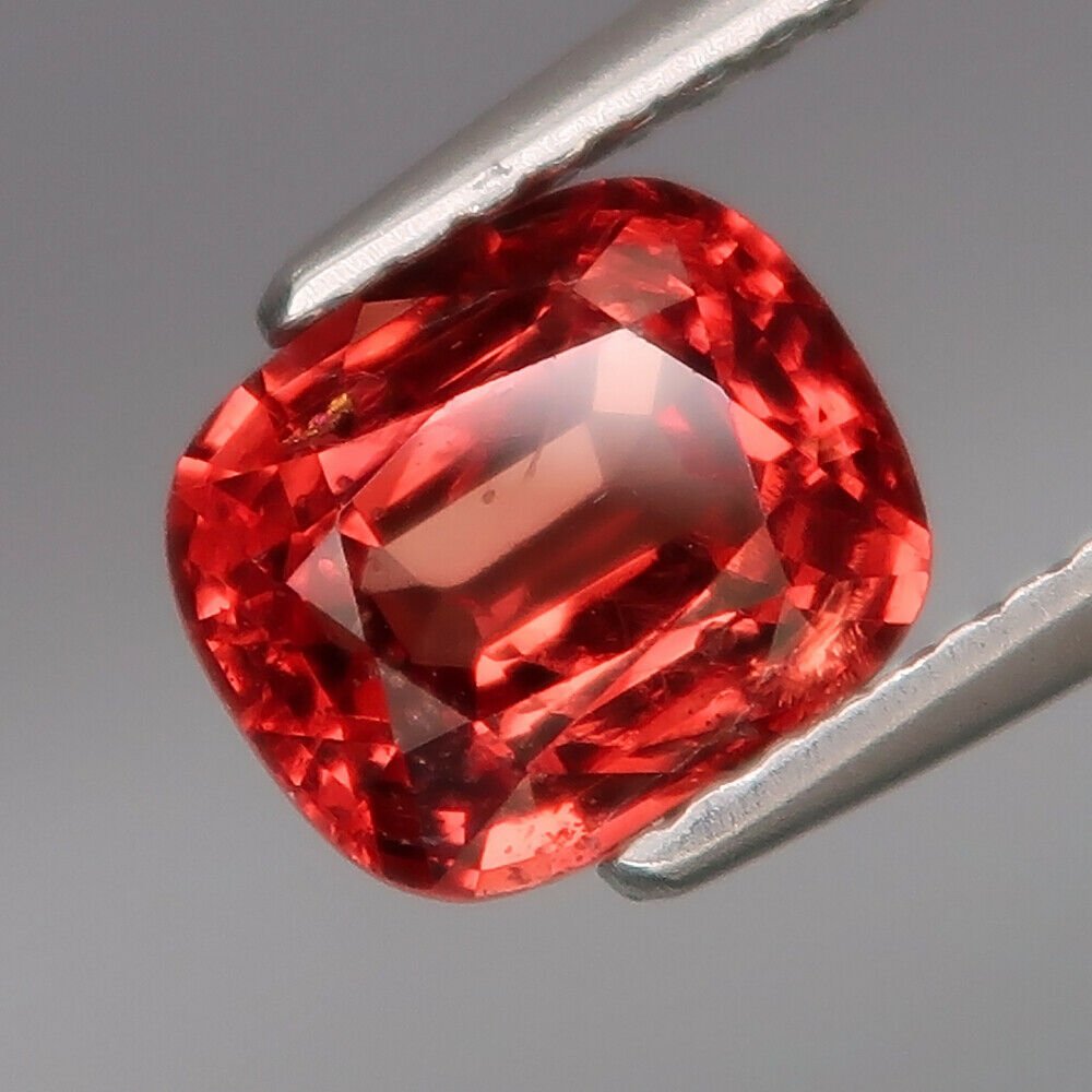 1.83 ct. Natural Padparadscha color Spinel - MYANMAR: 1.83 ct. Natural Padparadscha color Spinel - MYANMAR Color - Orangy Pink Clarity - SI Cut - Cushion Ct. Weight - 1.83 ct. Dimensions - 7.60 X 6.40 X 4.20 mm