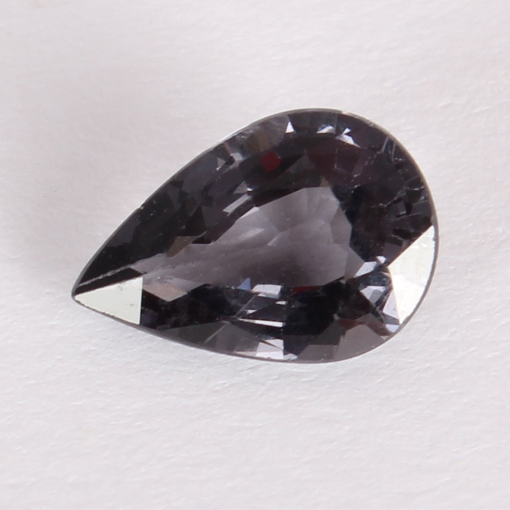 GFCO Cert. 1.90 ct. Bluish-Violet Spinel BURMA, MYANMAR: RESERVE PRICE - 150 EURO GFCO (SWISS) Certified 1.90 ct. Bluish-Violet Spinel - BURMA (MYANMAR) Color - Bluish Violet Cut - Pear Brilliant Step Cut Ct. Weight - 1.90 ct.
