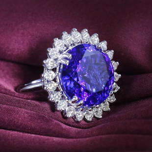 14 K White Gold Designer Tanzanite (GIA) & Diamond Ring: RESERVE PRICE - 20000 $ 14 K / 585 White Gold Designer Tanzanite (GIA Certified) and Diamond Ring Tanzanite - Certified By GIA 14 K Hallmarked White Gold Gross metal weight - 1