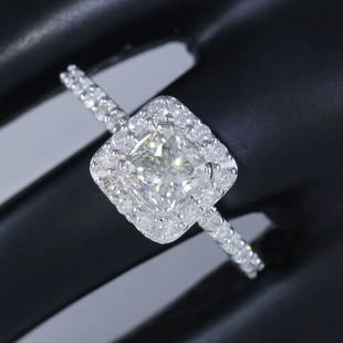 14 K / 585 White Gold Designer Solitaire Diamond (IGI Certified) Ring: RESERVE PRICE - 1000 $ 14 K / 585 White Gold Designer Solitaire Diamond (IGI Certified) Ring 14 K / 585 Hallmarked White gold Gross Metal Weight - 3.20