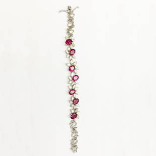 14 K / 585 White Gold Diamond and Rubies Bracelet: RESERVE PRICE - 8000 $ 14 K / 585 White Gold Diamond and Rubies Bracelet Hand crafted Bracelet with side hinges and tongue lock Extra side lock for security