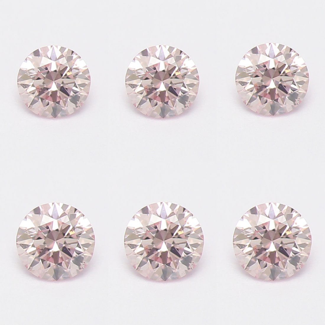 Set of 6 - 0.12 ct. Light Pink Diamond Lot - UNTREATED: Set of 6 - 0.12 ct. Light Pink Diamond Lot - I - UNTREATED Cut - Round Brilliant Color - Light Pink Clarity - I Ct. Weight - 0.02 x 6 = 0.12 ct. Number of diamonds - 6 Treatment