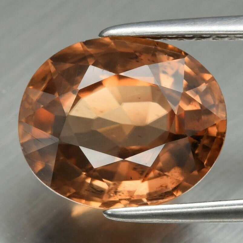 5.12 ct. Natural Yellow Zircon - MADAGASCAR: 5.12 ct. Natural Yellow Zircon - MADAGASCAR Shape - Oval Color - Yellow Clarity - VS Ct. Weight - 5.12 ct. Dimensions - 10.50 x 9.00 x 5.00 mm Origin - MADAGASC