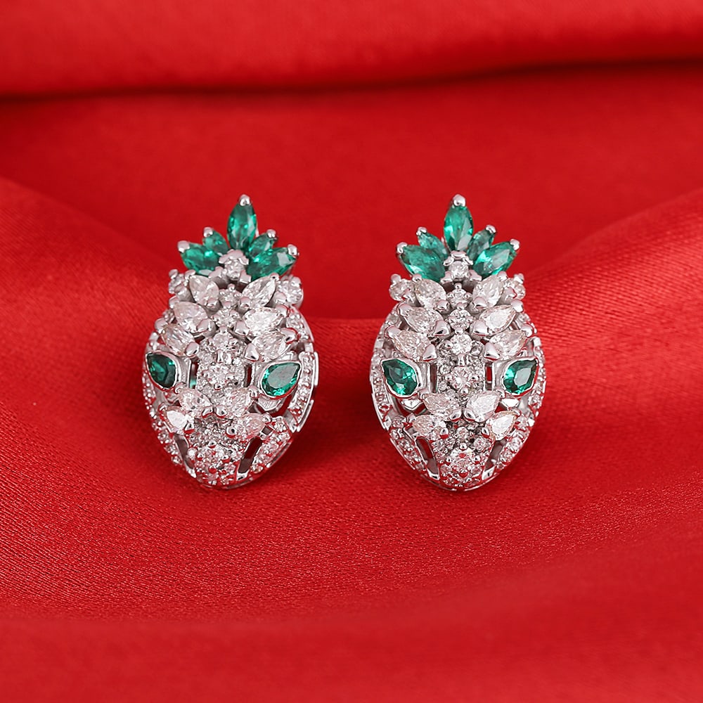 14 K / 585 White Gold Bvlgari Style Serpenti Earrings: 14 K / 585 White Gold Bvlgari Style Serpenti Earrings 14 K / 585 Hallmarked White gold Gross metal weight - 7.000 g Dimensions - 20 mm x 12 mm Diamond Details