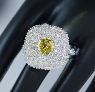IGI Certified 14 K / 585 Alexandrite (Color Change) & Diamond Ring: IGI Certified 14 K / 585 Designer IGI Certified Alexandrite (Color Change) & Diamond Ring Ring in 14 K Hallmarked White gold Gross metal weight - 10.730 g Dimensions - Top 19 mm x 19 mm Total Gem we
