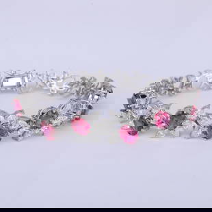14 K / 585 White Gold Diamond and Rubies Bracelet: 14 K / 585 White Gold Diamond and Rubies Bracelet Hand crafted Bracelet with side hinges and tongue lock Extra side lock for security Gross gold weight - 22.360 g 14 K solid Hallmarked