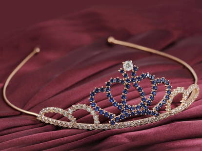 14 K / 585 IGI Certified Rose Gold Tiara / Head Gear: IGI Certified 14 K Rose Gold 11.06 ct. Diamonds and 5.60 ct. Blue Sapphire Tiara/Head Gear Top Dimensions 4 inches x 1.5 inches Flexible and easy to wear 14 K / 585 Hallmarked Rose gold Gr