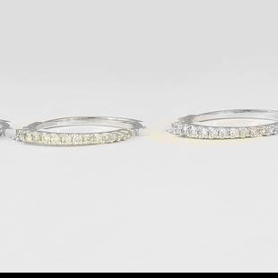 14K / 585 Pair of White Gold Diamond Band Rings: 14 K / 585 Pair of White Gold Diamond Band Rings Gross gold weight - 2.520 g 14 K Solid Hallmarked White Gold Ring size - US 7 Diamond Details Ct. Weight - 0
