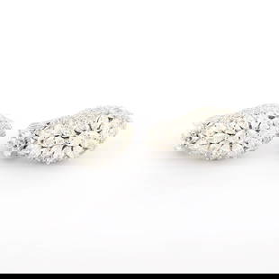 IGI Certified 14 K / 585 White Gold Diamond Earrings: IGI Certified 14 K / 585 White Gold Diamond Earrings 14 K Hallmarked White gold Gross metal weight - 14.920 g Diamond Details Total Diamonds wt. - 6.25 ct. Cut - Round,