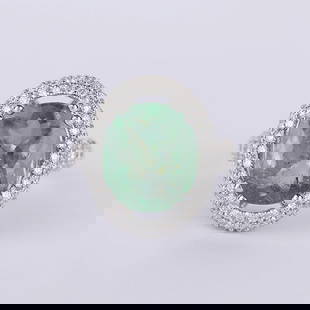IGI Certified 14 K / 585 White Gold Tourmaline (GIA) & Diamond Ring: IGI Certified 14 K / 585 White Gold Tourmaline (GIA) & Diamond Ring 14 K Hallmarked White Gold Gross gold Weight - 10.580 g Ring size - US 7 Tourmaline Details Cut - O