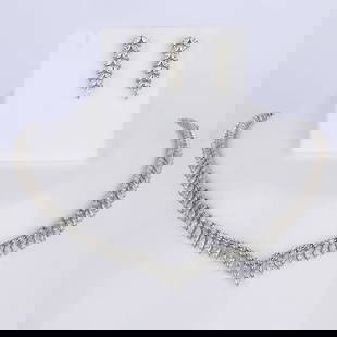 14 K / 585 Hallmarked White Gold Necklace & Earrings: 14 K / 585 Hallmarked White Gold Necklace & Earrings 14 K / 585 Hallmarked White Gold Gross Gold Weight - 38.240 g Necklace Gold Weight - 33.390 g Earrings Gold Weight - 4