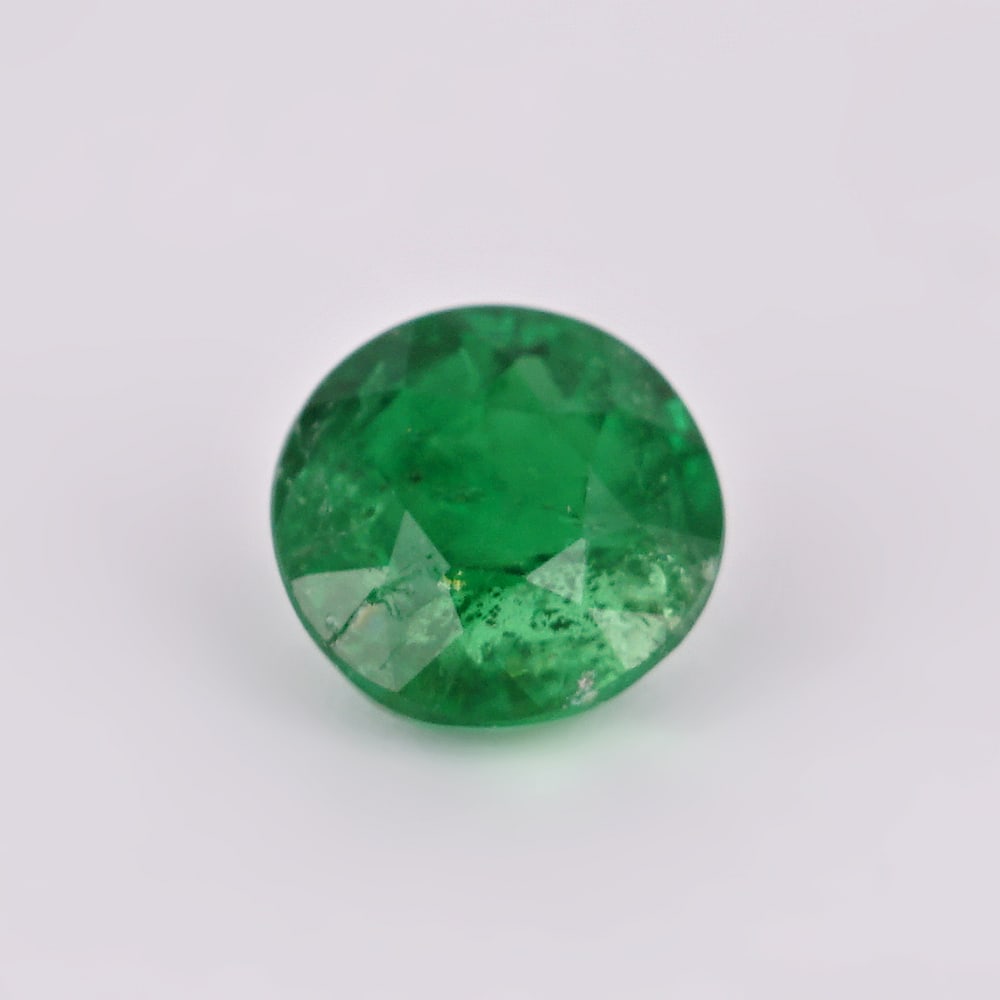 0.92 ct. Tsavorite Garnet - KENYA, EAST-AFRICA: 0.92 ct. Tsavorite Garnet - KENYA, EAST-AFRICA Color - Vivid Green Cut - Round Ct. Weight - 0.92 ct. Clarity - VS Origin - KENYA, EAST-AFRICA Treatment -