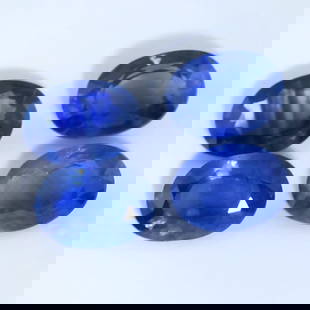 IGI Certified Set of 4 Blue Sapphires - MADAGASCAR: IGI Certified Set of 4 Blue Sapphires - MADAGASCAR Color - Blue Cut - Oval Mixed cut Clarity - SI Ct. Weight - 1.28 + 0.86 + 0.85 + 0.99 = 3.98 ct. Dimensions - 7.12 x 5.14 x 3.42 mm ; 7.12 x