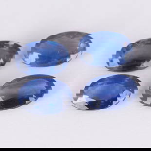IGI Certified 1.78 ct. Set of 4 Blue Sapphires - MADAGASCAR: IGI Certified 1.78 ct. Set of 4 Blue Sapphires - MADAGASCAR Color - Blue Cut - Oval Mixed cut Clarity - SI Ct. Weight - 0.44 + 0.48 + 0.49 + 0.37 = 1.78 ct. Dimensions - 5.87 x 3.86 x 2.06 mm