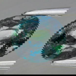1.37 ct. Natural Unheated Bluish Green Sapphire - NIGERIA: 1.37 ct. Natural Unheated Bluish Green Sapphire - NIGERIA Color - Bluish Green Cut - Oval Clarity - SI1 Ct. wt. - 1.37 ct. Dimensions - 6.35 x 5.52 x 4.09 mm Origin - NIG