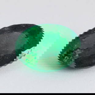 4.57 ct. Tsavorite Garnet - KENYA, EAST-AFRICA: 4.57 ct. Tsavorite (Grossular-Garnet) - KENYA, EAST-AFRICA Cut - Oval Color - Vivid Green Clarity - SI Ct. Weight - 4.57 ct. Origin - KENYA, EAST-AFRICA