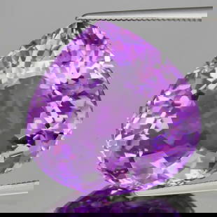 26.87 ct. Natural Purple Amethyst - URUGUAY: 26.87 ct. Natural Purple Amethyst - URUGUAY Ct. Weight - 26.87 ct. Color - Purple Clarity - IF Cut - Pear Dimensions - 20.60 x 20.60 x 12.40 mm Origin - URUGUAY<