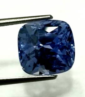 IGI Cert. 8.04 ct. Untreated Blue Sapphire - SRI LANKA: IGI Certified 8.04 ct. Untreated Blue Sapphire - SRI LANKA Color - Light Violetish Blue Cut - Rectangular Cushion Mixed Cut Ct. Wt. - 8.04 ct. Clarity - VS Dimensions - 10.12 x 9.62 x 8.57 mm<