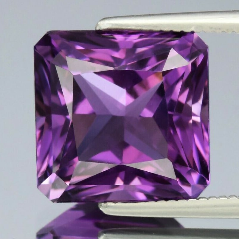 5.42 ct. Natural Unheated Purple Amethyst - URUGUAY: 5.42 ct. Natural Unheated Purple Amethyst - URUGUAY Cut - Radiant cut Color - Purple Clarity - IF Ct. Weight - 5.42 ct. Dimensions - 10.30 x 10.20 x 7.90 mm Origin - URUG