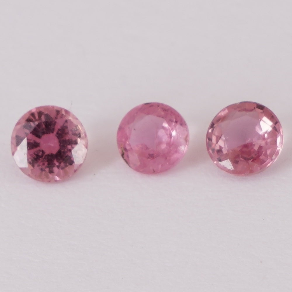 IGI 0.76 ct. Set of 3 Padparadscha Sapphires MADAGASCAR: IGI Certified 0.76 ct. Set of 3 Padparadscha Sapphires - MADAGASCAR Color - Pink Orange Cut - Round Mixed cut Clarity - VS Ct. Weight - 0.23 + 0.28 + 0.25 + = 0.76 ct. Dimensions - 3.52 - 3.49
