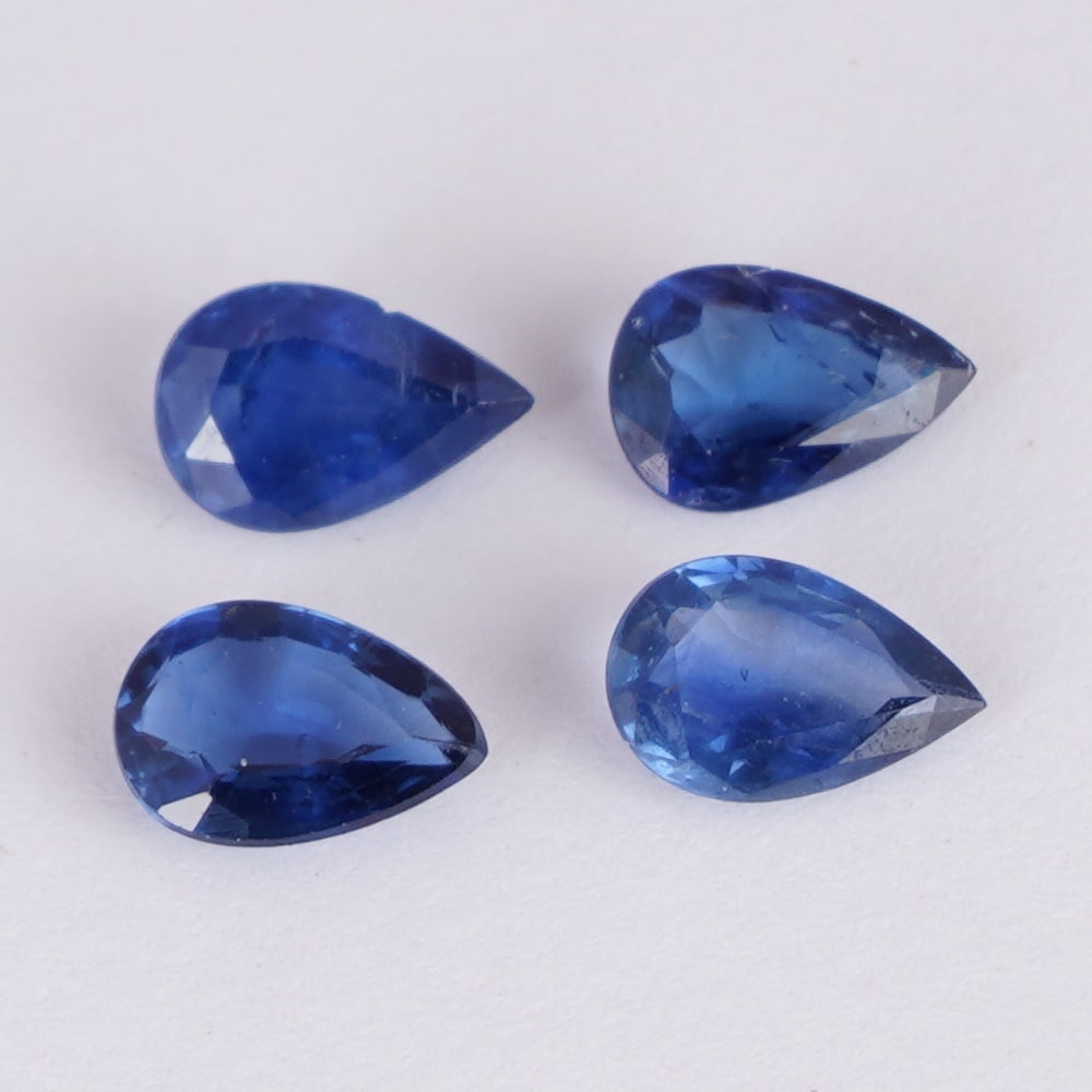 IGI Cert. 1.62 ct. Set of 4 Blue Sapphires - MADAGASCAR: IGI Certified 1.62 ct. Set of 4 Blue Sapphires - MADAGASCAR Color - Blue Cut - Pear Mixed cut Clarity - SI Ct. Weight - 0.43 + 0.46 + 0.38 + 0.35 = 1.62 ct. Dimensions - 5.92 x 4.06 x 2.01 mm