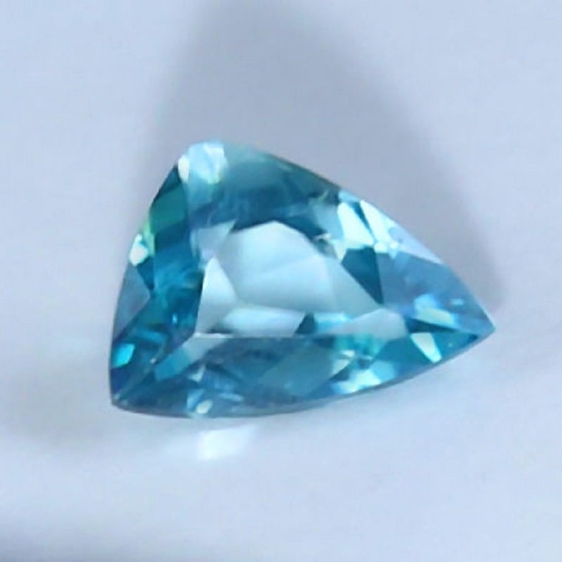 GIA Certified 0.28 ct. Rare Grandidierite: GIA Certified 0.28 ct. Rare Grandidierite Rare and Exceptional Stone Cut - Triangular Modified Brilliant Cut Color - Greenish Blue Clarity - VVS Ct. Weight - 0.28 ct. Dimensions