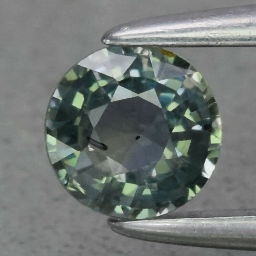 0.39 ct. Unheated Bluish Green Sapphire - TANZANIA (1 of 2)
