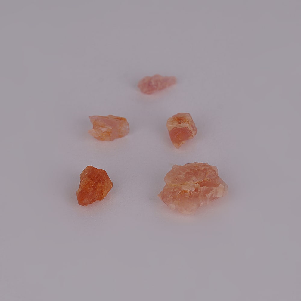 2.05 ct. Set of 5 Bixbite Rough - PAKISTAN: 2.05 ct. Set of 5 Bixbite Rough - PAKISTAN Color - Orange Ct. Weight - 2.05 ct. Origin - PAKISTAN Treatment - None Certificate of authenticity