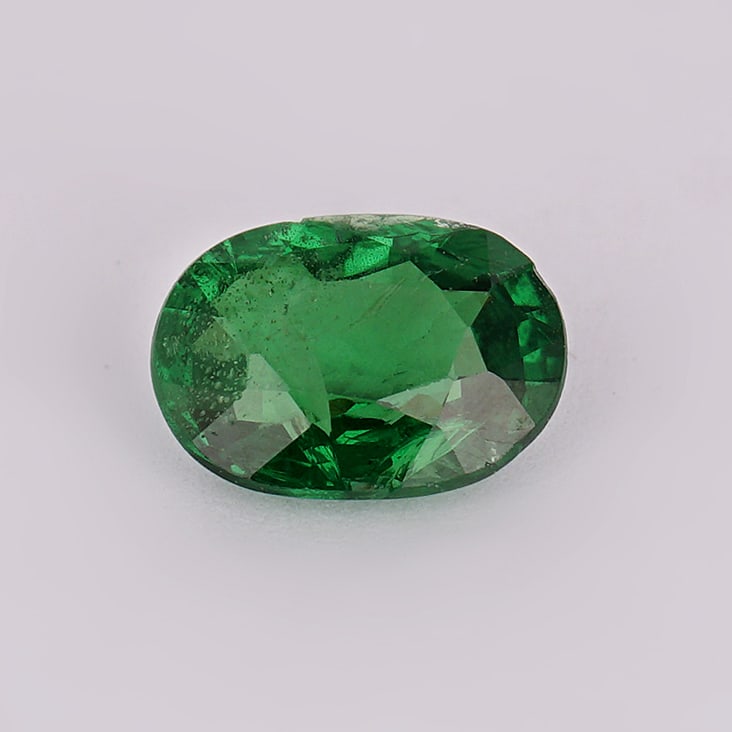 1.05 ct. Tsavorite Garnet - KENYA, EAST-AFRICA: 1.05 ct. Tsavorite Garnet - KENYA, EAST-AFRICA Color - Vivid Green Clarity - VS Cut - Round Ct. Weight - 1.05 ct. Origin - KENYA, EAST-AFRICA Treatment -