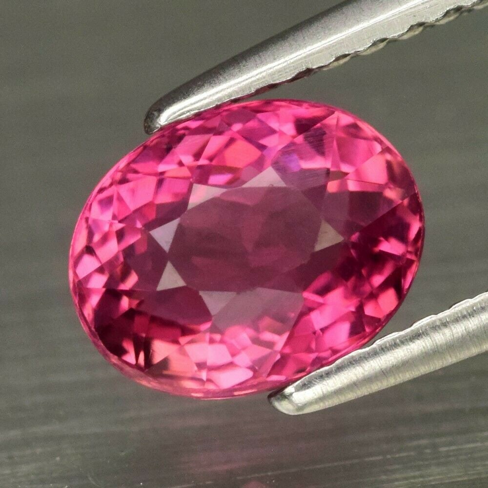 1.42 ct. Unheated Purplish Pink Tourmaline - MOZAMBIQUE: 1.42 ct. Natural Unheated Purplish Pink Tourmaline - MOZAMBIQUE, AFRICA Shape - Oval Color - Purplish Pink Clarity - IF Ct. Weight - 1.42 ct. Dimensions - 7.50 x 6.00 x 4.50 mm <