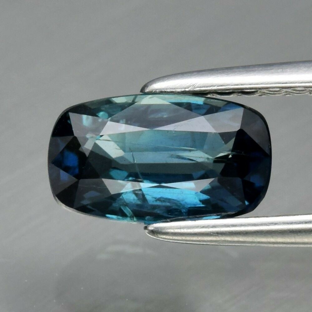 1.11 ct. Unheated Greenish Blue Sapphire - MADAGASCAR: 1.11 ct. Natural Unheated Greenish Blue Sapphire - MADAGASCAR, AFRICA Shape - Long Cushion Color - Greenish Blue Clarity - SI1 Ct. Weight - 1.11 ct. Dimensions - 7.60 x 4.50 x 3.00 mm <