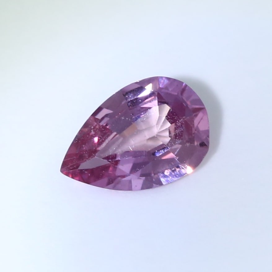 IGI Certified 0.59 ct. Ruby - MADAGASCAR: IGI Certified 0.59 ct. Ruby - MADAGASCAR Cut - Pear Mixed cut Color - Purple Red Clarity - VS Transparency - Transparent Ct. Weight - 0.59 ct. Dimensions - 6.87 x 4.59 x 2.45 mm </