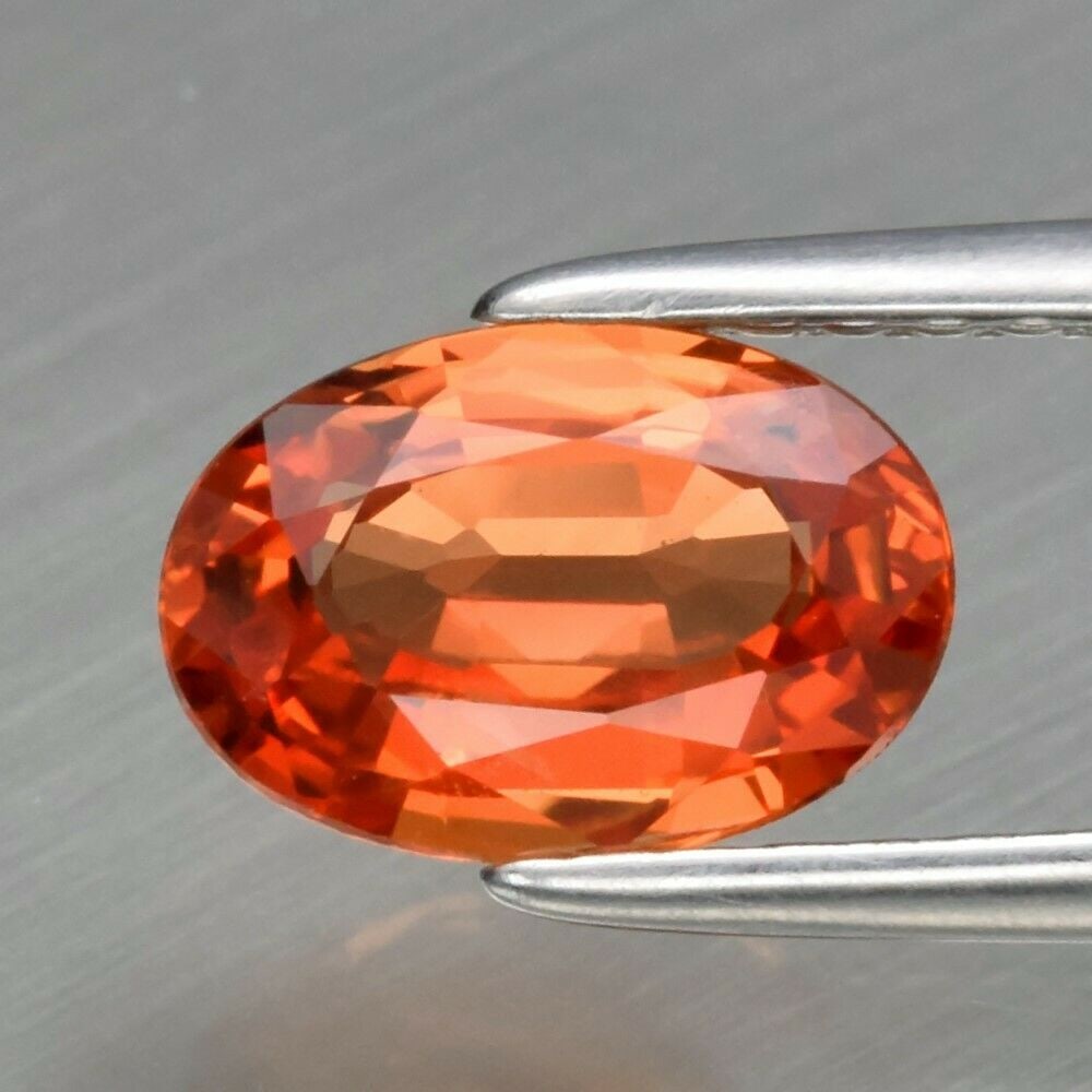 1.13 ct. Natural Padparadscha Sapphire - TANZANIA: 1.13 ct. Natural Padparadscha Sapphire - TANZANIA Shape - OvalColor - Orange PinkClarity - VVSCt. Weight - 1.13 ct.Dimensions - 7.80 x 5.30 x 3.00 mm Origin - TANZANIA, AFRICA Treatment - Heated.