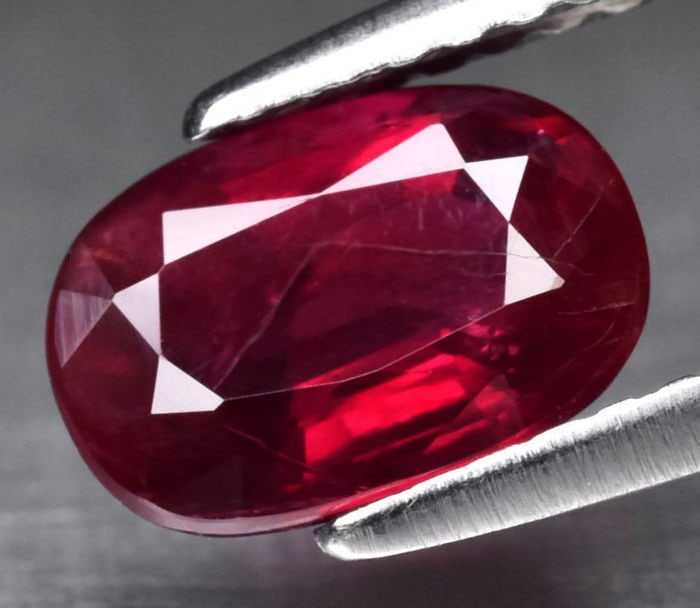 GIA Certified 1.61 ct. Untreated Ruby - MOZAMBIQUE: GIA Certified 1.61 ct. Untreated Ruby - MOZAMBIQUE Cut - Oval Brilliant Step cut Color - Red Clarity - SI Ct. Weight - 1.61 ct. Dimensions - 8.13 x 5.53 x 3.71 mm Origin -