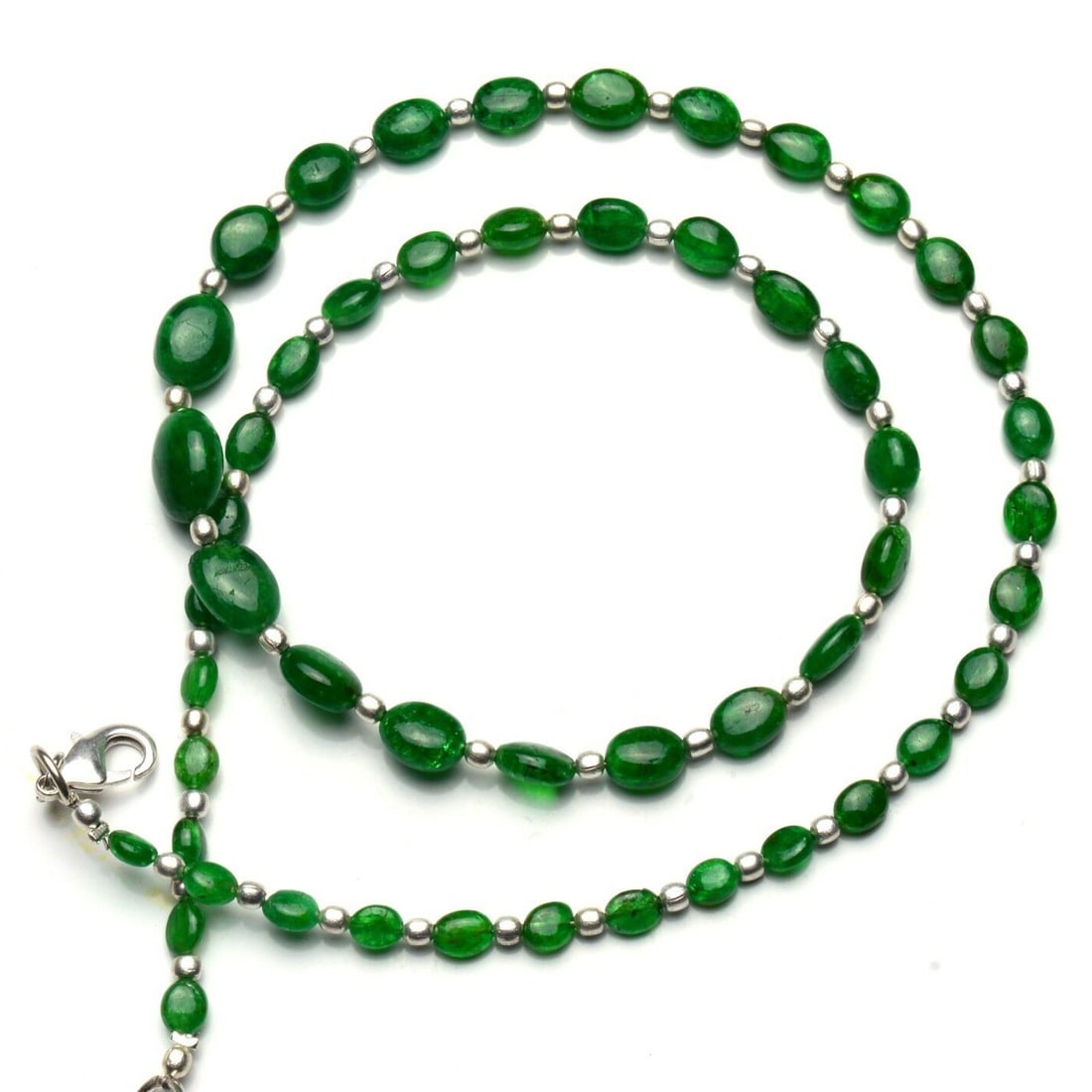77.00 ct. Tsavorite Garnet Nugget Beads Necklace: 77.00 ct. Natural Tsavorite Garnet Nugget Beads Single strand Necklace Color - Green Shape - Nugget Beads Size - 6 x 4 to 11 x 9 mm Approx. Gem Weight - 77.00 ct. With sterling silver
