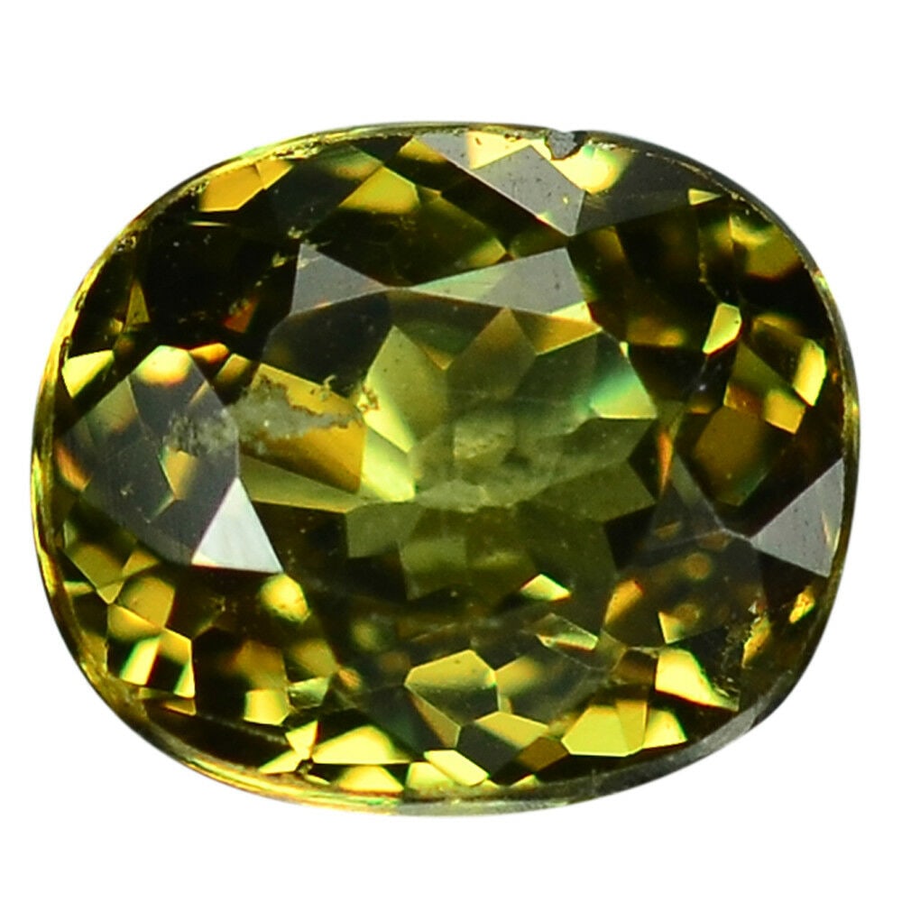 RARE 1.00ct. Natural Green Demantoid Garnet MADAGASCAR: RARE 1.00 ct. Natural Green Demantoid Garnet - MADAGASCAR Shape - Cushion Color - Green Clarity - VVS Ct. Weight - 1.00 ct. Dimensions - 6.18 x 5.25 x 3.43 mm Origin - MA