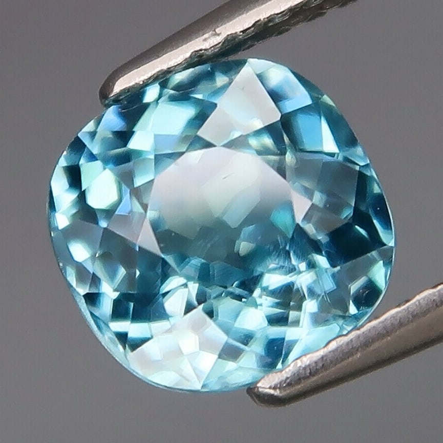 2.65 ct. Natural Blue Zircon - CAMBODIA: 2.65 ct. Natural Blue Zircon - CAMBODIA Shape - Cushion Color - Blue Clarity - SI Ct. Weight - 2.65 ct. Dimensions - 7.40 X 7.20 X 4.50 mm Origin - CAMBODIA <