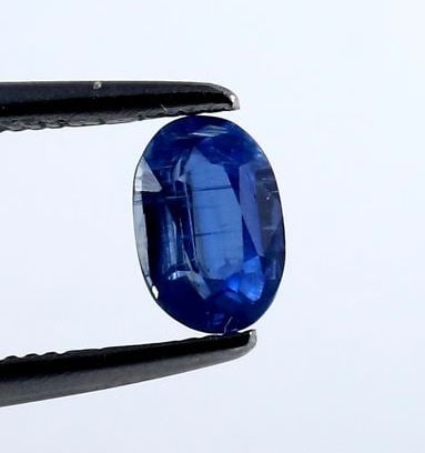 IGI Certified 0.45 ct. Blue Kyanite - NEPAL: IGI Certified 0.45 ct. Blue Kyanite - NEPAL 100% natural Cut - Oval Mixed Cut Color - Blue Clarity - SI Ct. wt.- 0.45 ct. Dimensions - 5.81 X 3.93 X 2.40 mm Origin