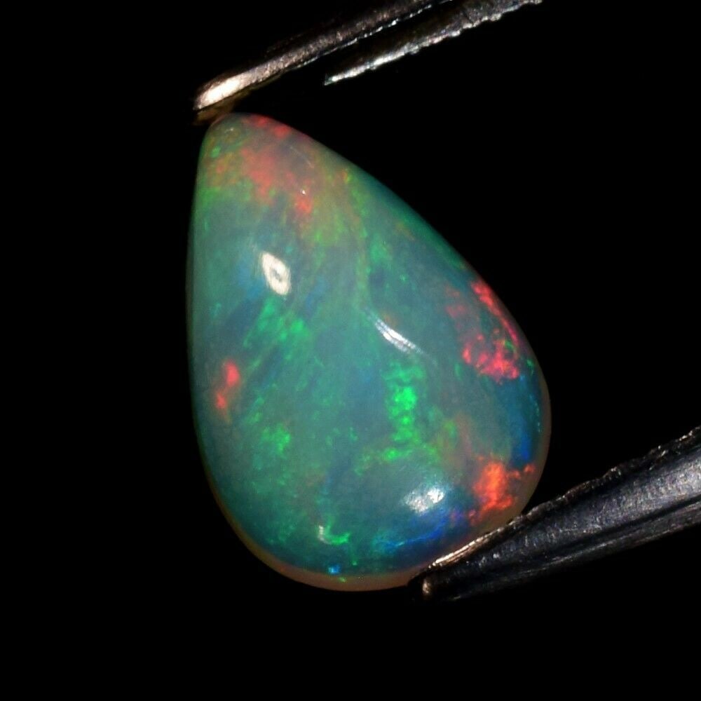 1.09 ct. Natural Play of Color White Opal - ETHIOPIA (1 of 2)