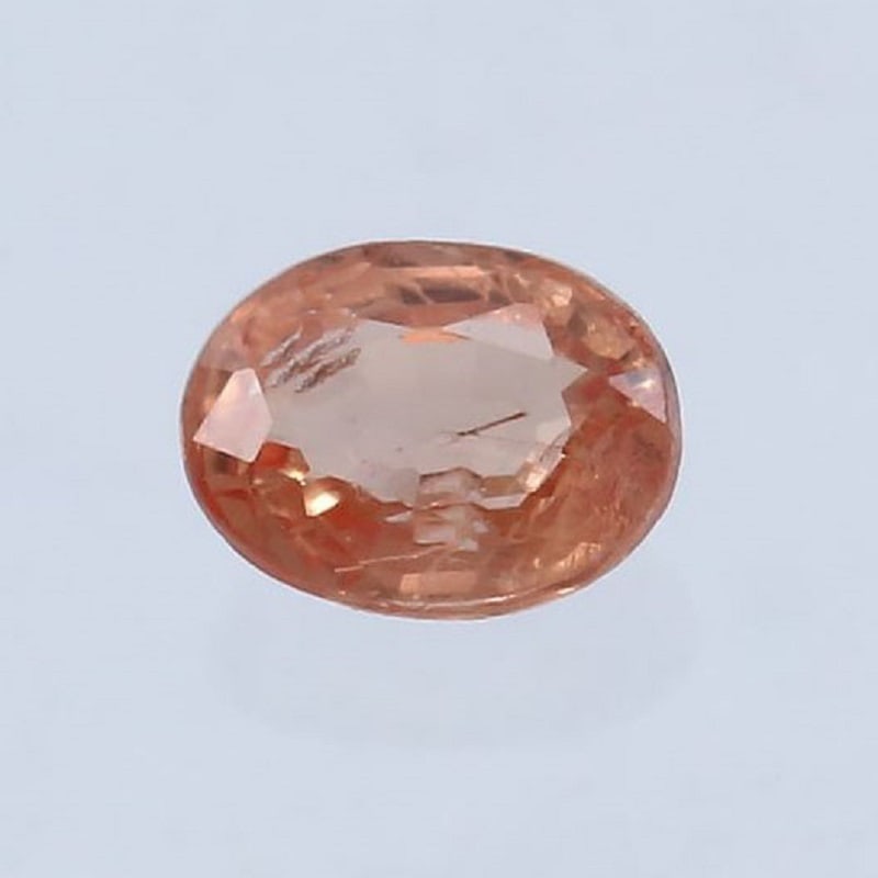 IGI Cert. 0.22 ct. Padparadscha Sapphire - SRI LANKA: IGI Certified 0.22 ct. Padparadscha Sapphire - SRI LANKA, CEYLON Ct. Weight - 0.22 ct. Cut - Oval Mixed Cut Color - Pinkish Orange Clarity - SI Dimensions - 3.83 X 2.94 X 1.96 mm