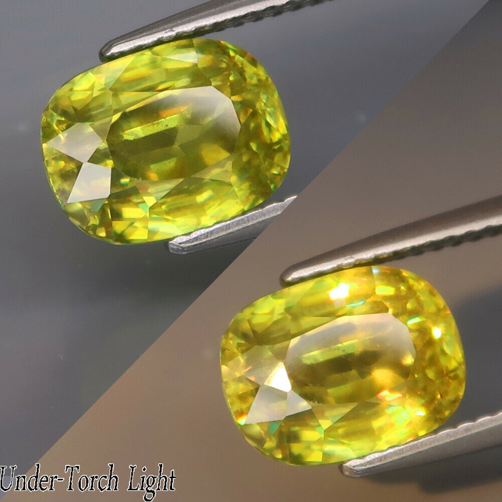 4.06 ct. Natural Sphene - RUSSIA: 4.06 ct. Natural Sphene - RUSSIA Color - Lime Yellow with Rainbow Spark Cut - Oval Clarity - I1 Ct. wt. - 4.06 ct. Dimensions - 10.00 x 7.60 x 6.10 mm Origin - RUSSIA