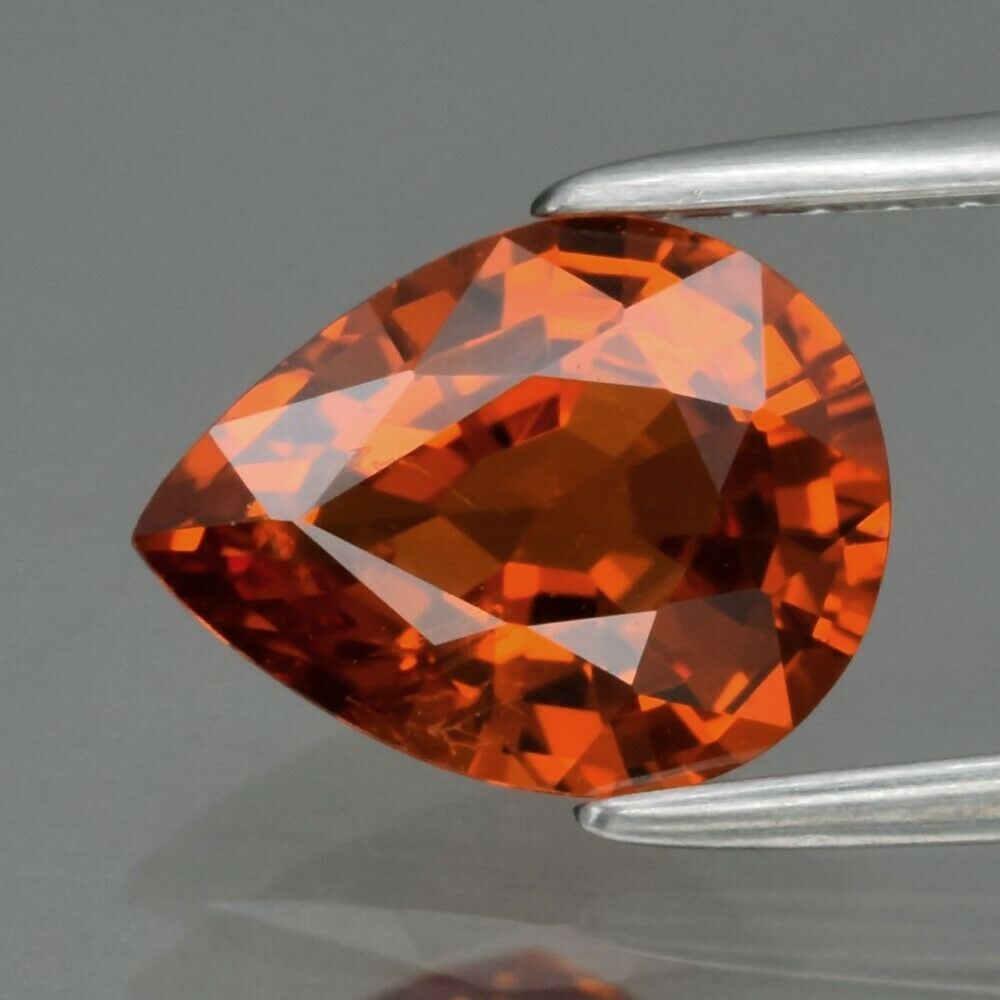 1.68 ct. Unheated Orange Spessartite Garnet - NAMIBIA: 1.68 ct. Natural Unheated Orange Spessartite Garnet - NAMIBIA Cut - Pear Color - Orange Clarity - SI1 Ct. Weight - 1.68 ct. Dimensions - 8.50 x 6.60 x 3.70 mm Origin - NA