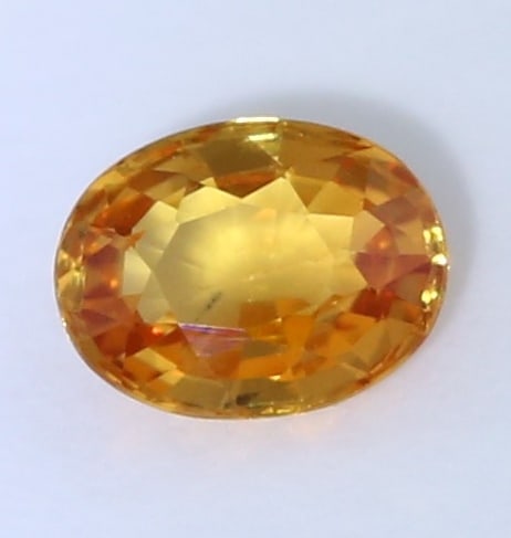 IGI Cert. 0.23 ct. Yellow Orange Sapphire - MADAGASCAR: IGI Certified 0.23 ct. Yellow Orange Sapphire - MADAGASCAR Ct. Wt. - 0.23 ct. Cut - Oval Mixed Cut Color - Yellow Orange Clarity - SI Dimensions - 4.05 x 3.11 x 1.97 mm Origin