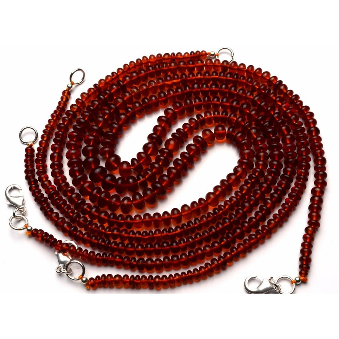 100.00 ct. Hessonite Garnet Rondelle Beads Necklace: 100.00 ct. Natural Hessonite Garnet Rondelle Beads Single strand Necklace Color - Orange Shape - Rondelle beads Gem Weight - 100.00 ct. Size - 4 to 6 mm Approx. No. of necklace - 1